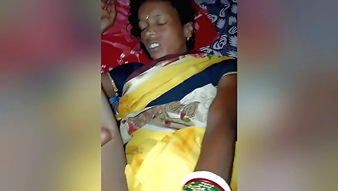 Indian babe has her hairy pussy and ass on the bed