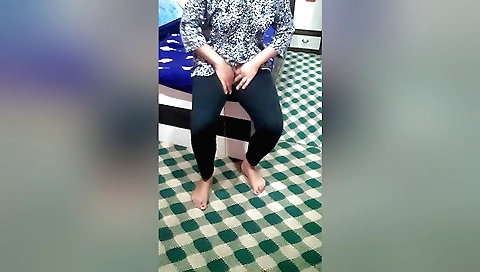 Sweet Asian girl is on top of her pussy to play with it