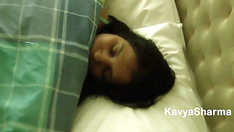 Indian woman in lingerie in bed has sex with herself