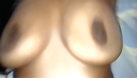 A hot brunette plays with her boyfriend's hard cock