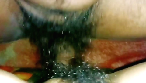 Hairy babe on the bed and she is masturbating in pov