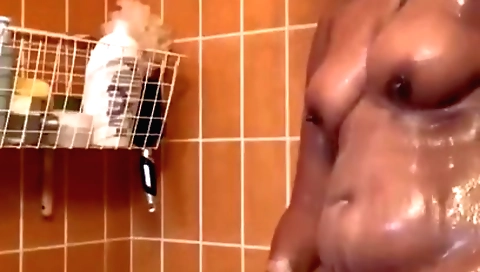 Sexy big ass brunette shows off her body in shower