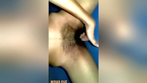Indian girl is showering on a bed in hot home videos
