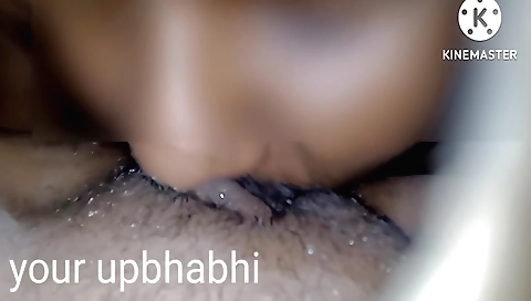 Indian babe with a shaved pussy gives a blowjob to a man