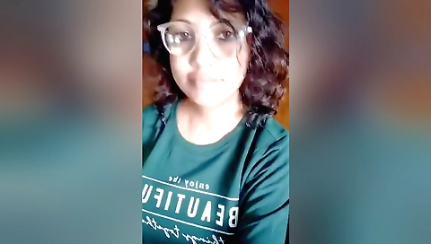 Busty brunette babe showing off her naked body in the studio