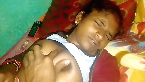 Busty brunette is on the bed and she is getting her pussy wet