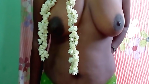 Busty brunette in a sexy sari is sexy in a solo video