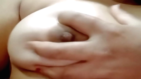 Indian girl in a dress shows off her ass and her body