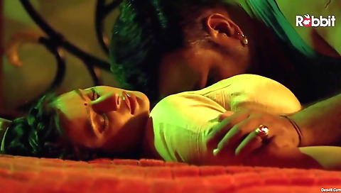 Hot brunette babe with a sexy body and black lingerie in bed