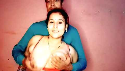 Indian babe with big tits dancing with a dude in the kitchen