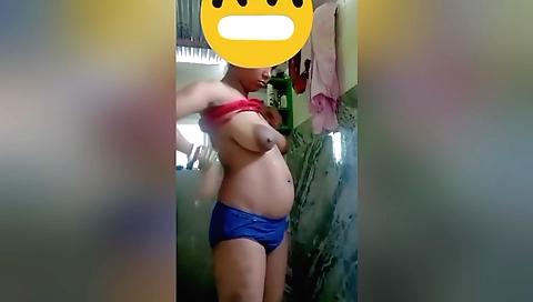 Indian hairy brunette with big tits enjoys her bathroom