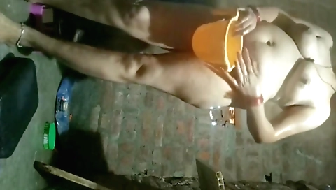 Hot solo female takes it in the bath in bathing suit