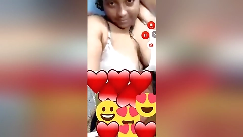 Busty brunette with large tits shows off her curves