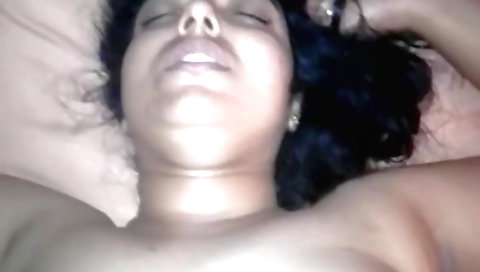 Indian chick has her big tits pulled and she is giving a blowjob