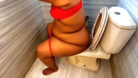 Indian brunette in a bikini towel gets naked in shower