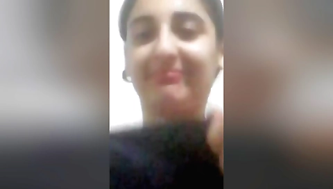 Amateur brunette with nice curves and tits showing