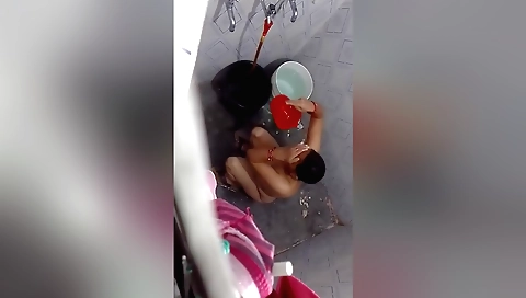 Beautiful brunette naked and stretching in the hottest bath