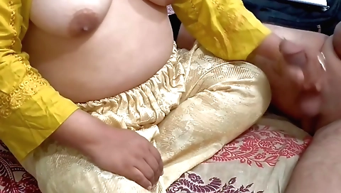 Big ass stepmom with natural tits giving a handjob to her stepson