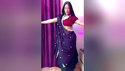 Amateur female in sexy dress with a big booty gets naked