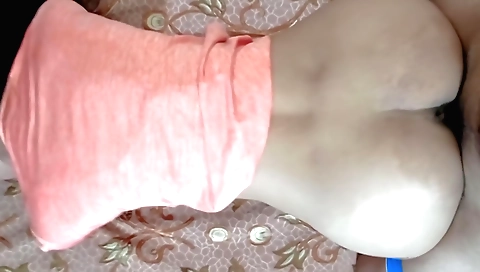 Slutty brunette with an amateur webcam shows her ass