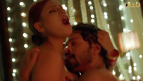 Brunette is getting dressed in her black outfit and a white dress