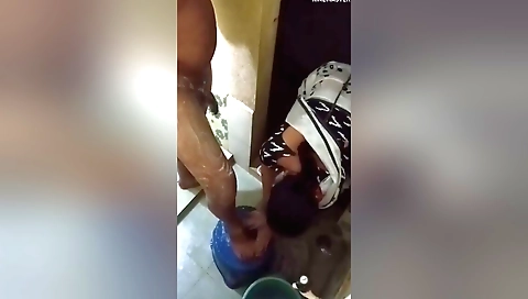 A brunette is getting wet while fucking on the bed