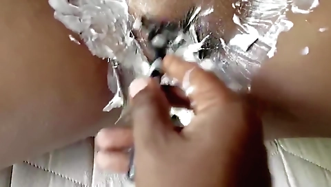 Indian hairy slut strips naked and licks her pussy